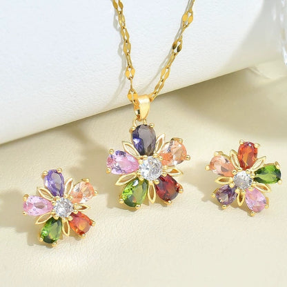 Joyería de flor de cinco pétalos con cristales dorados de colores