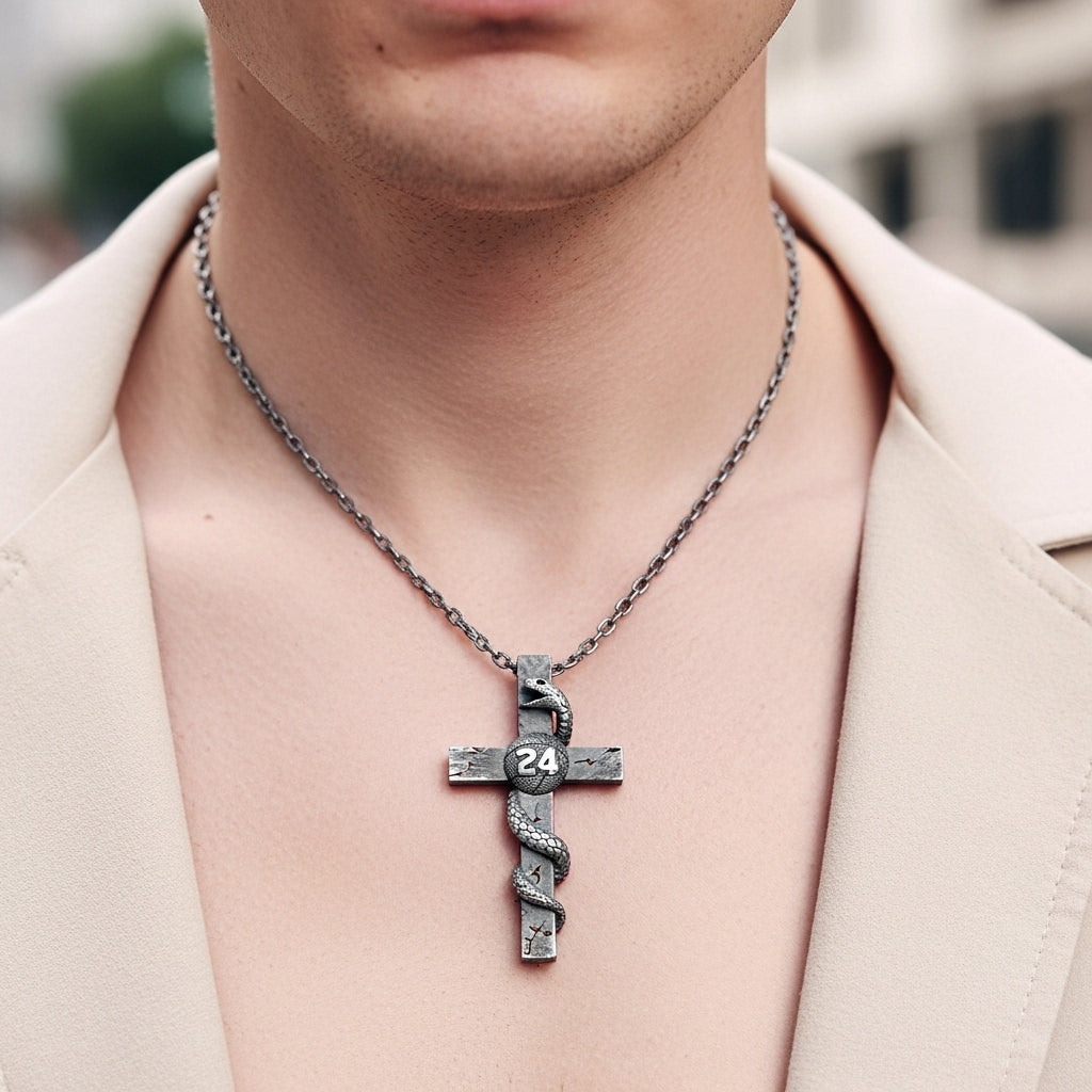 Collar de cruz y serpiente de plata